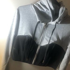 Cropped grey jacket with black bra lining